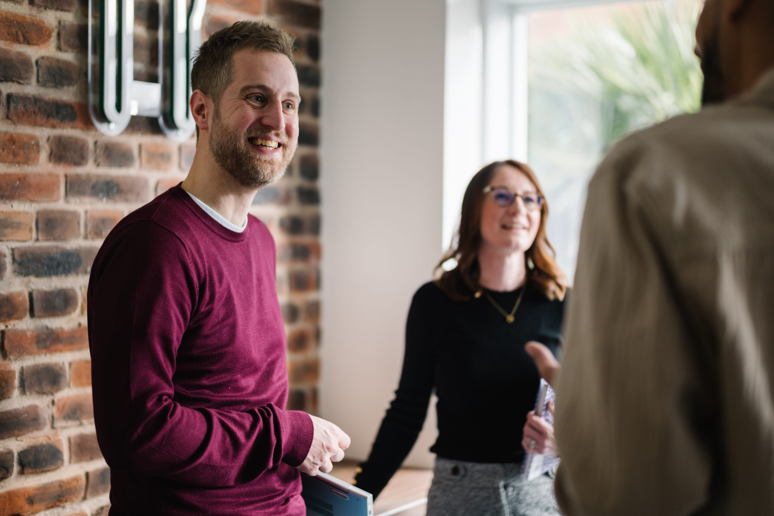 Chris talking with colleagues